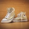 brown Converse high top shoes