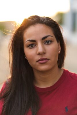 woman wearing red Polo Ralph Lauren crew-neck shirt