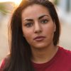 woman wearing red Polo Ralph Lauren crew-neck shirt