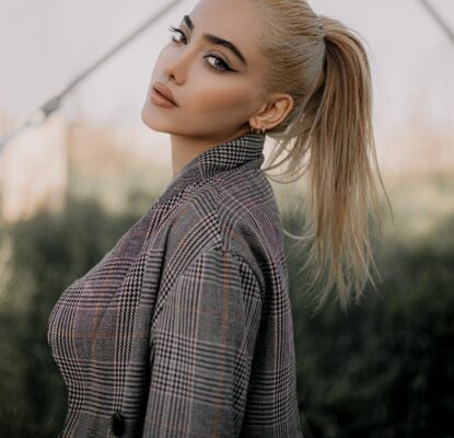 woman in black and white pinstripe dress shirt